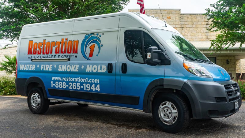 restoration 1 van outside building