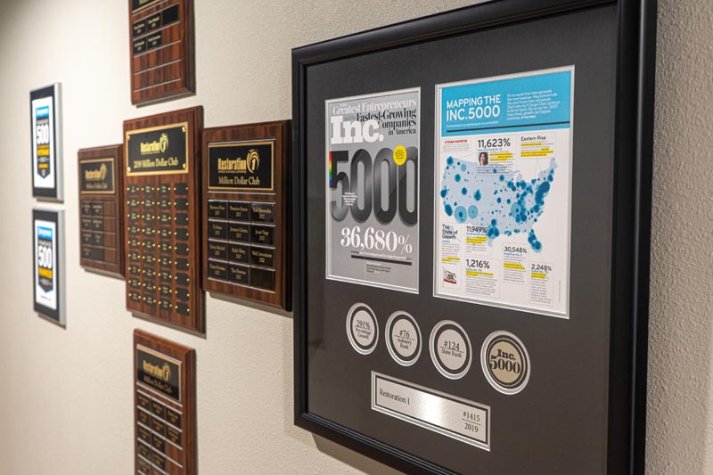 various awards on wall