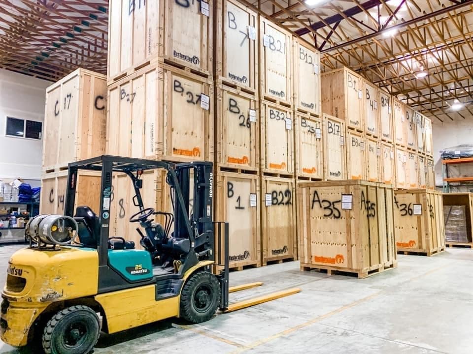 photo of forklift and crates